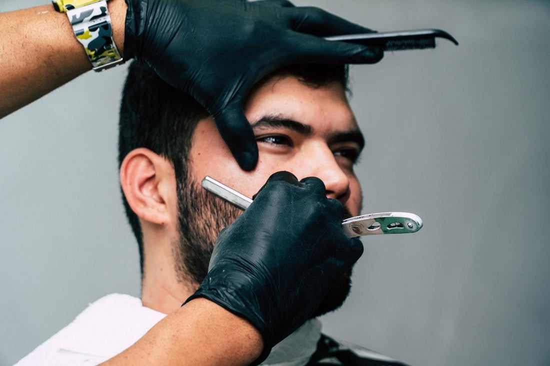 a man shaving his beard